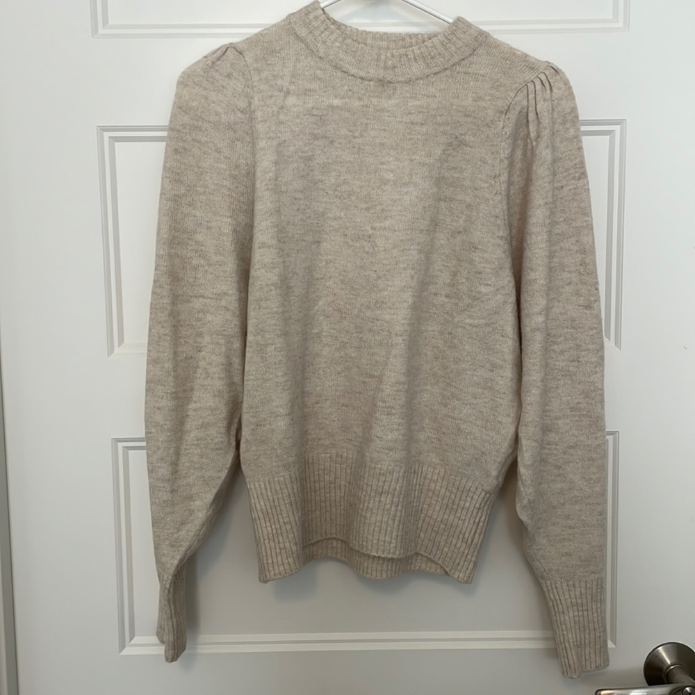 Cream sweater with bubble shoulders (never worn)